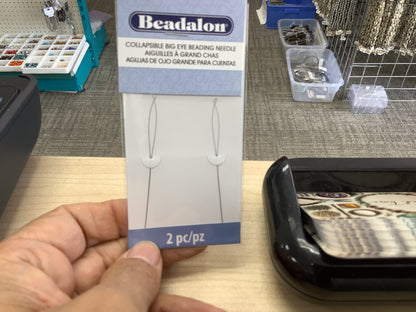 Collapsible big eye needle